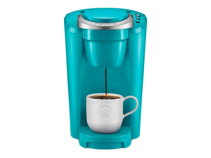 The turquoise model of the Keurig K-Compact coffee maker against a white background.