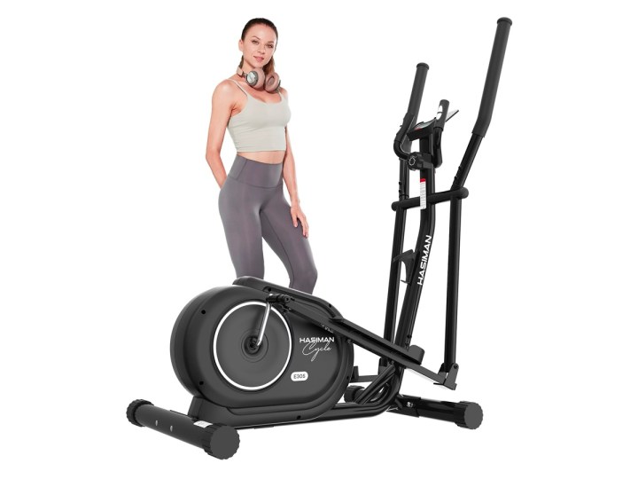 A woman standing with the Hasiman magnetic elliptical machine against a white background.