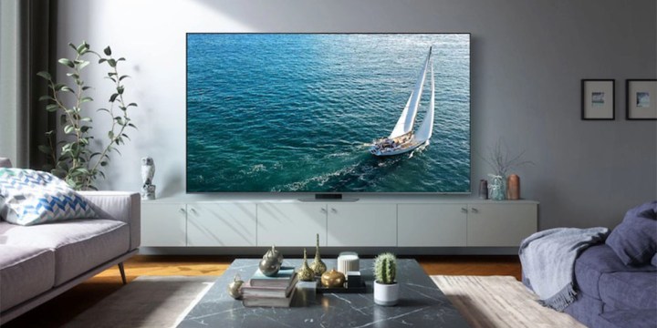 The Samsung Q80C placed in a living room on a TV stand.