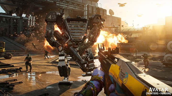 A Na'vi shoots a gun at a mech in Avatar: Frontiers of Pandora.