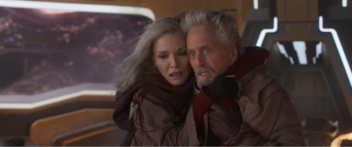 Michelle Pfeiffer and Michael Douglas embrace in a scene from Ant-Man and the Wasp: Quantumania.