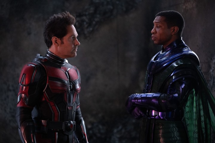 Paul Rudd and Jonathan Majors stare at each other in a scene from Ant-Man and the Wasp: Quantumania.
