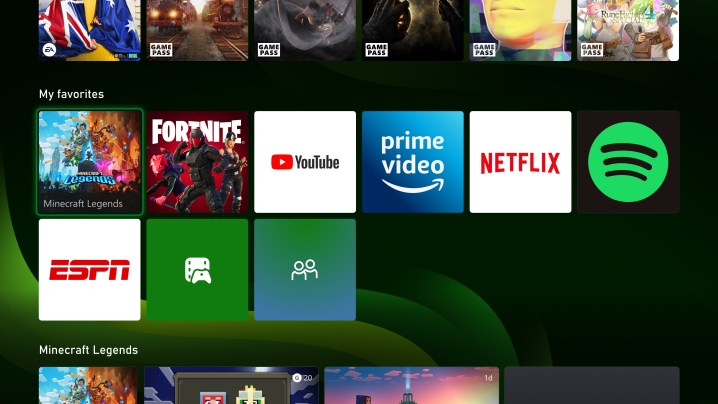 An Xbox home screen shows a favorites widget.