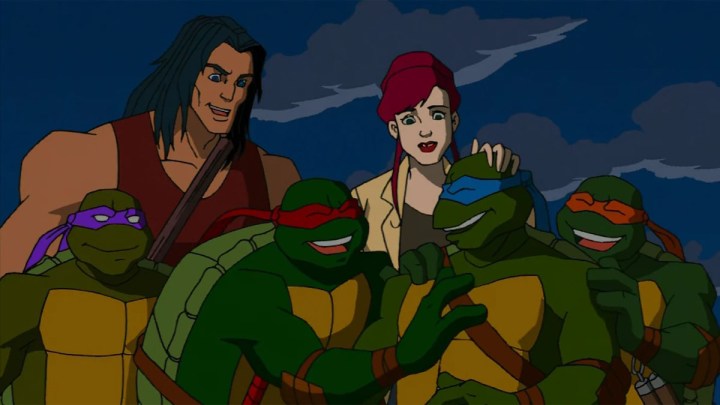 Casey and April celebrate with the TMNT in Teenage Mutant Ninja Turtles.
