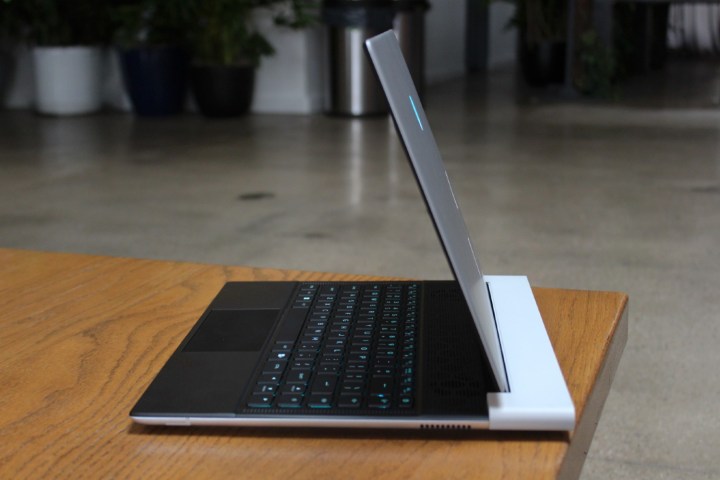 The side profile of the Alienware x14 R2 on a table.