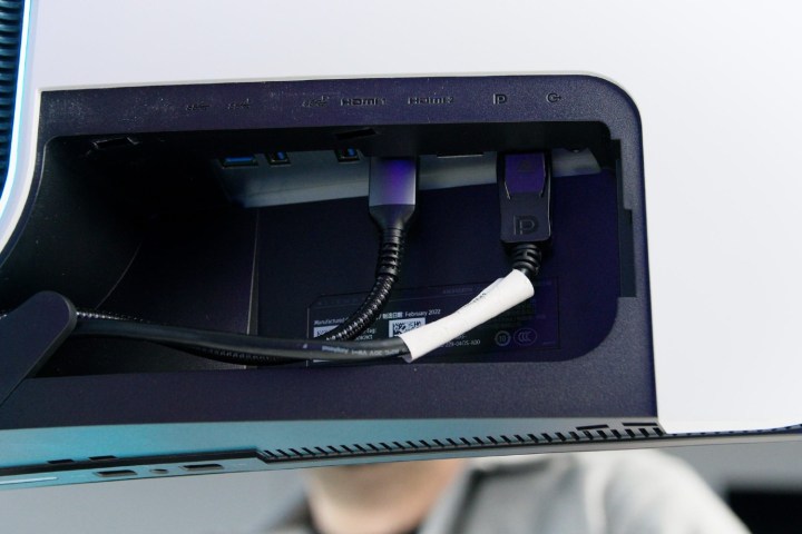 The ports on the back side of the Alienware 34 monitor.