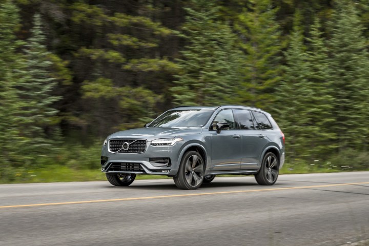 A grey 2020 Volvo XC90-R driving on a road. 