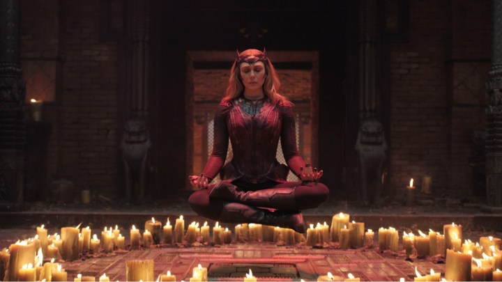 Scarlet Witch levitates in a circle of candles in "Doctor Strange in the Multiverse of Madness."
