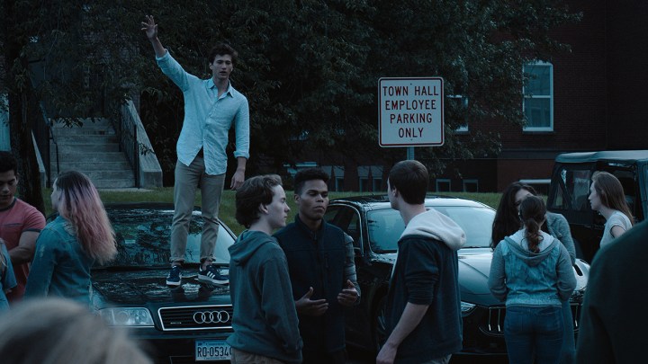 The cast of the Netflix show The Society arguing on the street.