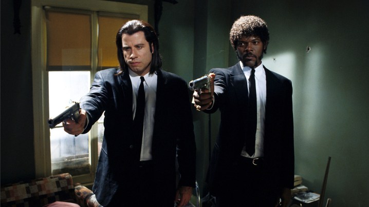John Travolta and Sam Jackson star in Pulp Fiction, directed by Quentin Tarantino.