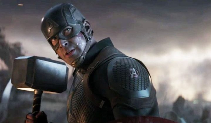Cap holds Thor's hammer in "Avengers: Endgame."