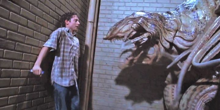 Elijah Wood gets cornered by a giant alien in The Faculty.