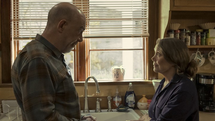 J.K. Simmons and Sissy Spacek in the kitchen looking at one another in a scene from Night Sky.