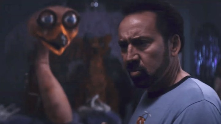 Nicolas Cage and an animatronic friend in Willy's Wonderland.
