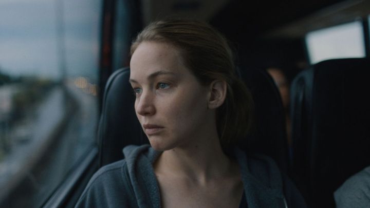 Jennifer Lawrence as Lynsey looking out a bus window in Causeway.