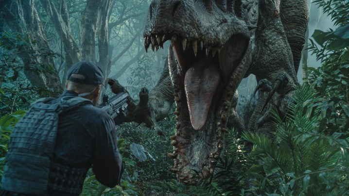 The Indominus Rex about to kill an armed security member in Jurassic World.