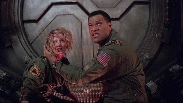 Kathleen Quinlan and Laurence Fishburne in Event Horizon.