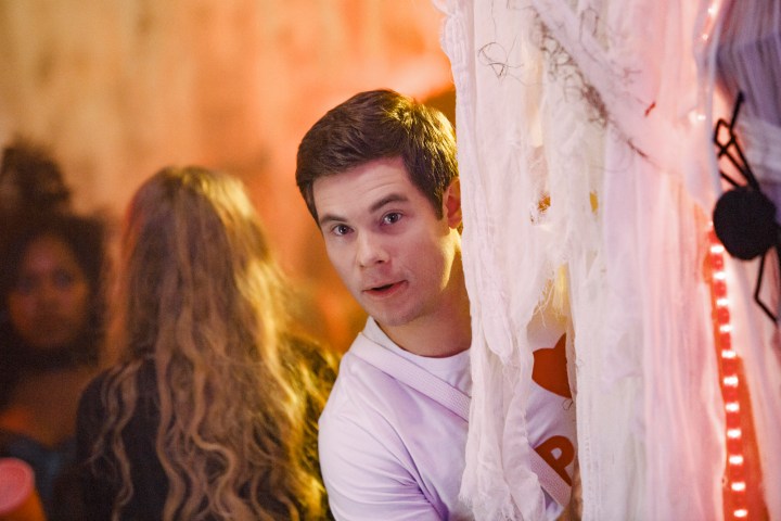 Adam DeVine stands around a corner in When We First Met.