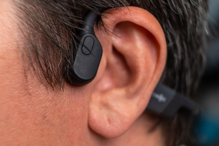 Man wearing bone-conducting headphones.