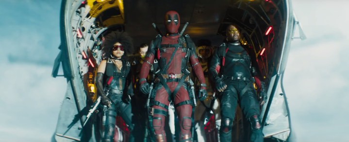 Deadpool and the X-Force ready to jump out of a plane in Deadpool 2.