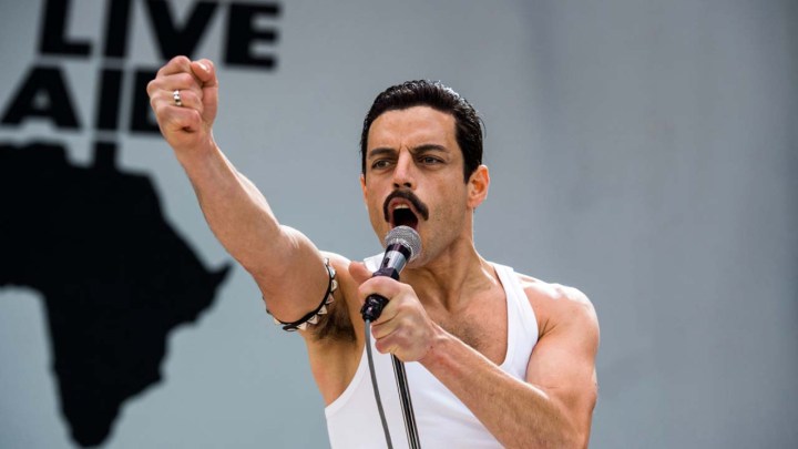 Freddie Mercury performing at a concert in Bohemian Rhapsody.