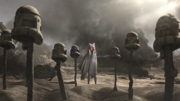 Ahsoka standing before the graves of her fallen friends and comrades in The Clone Wars series finale.