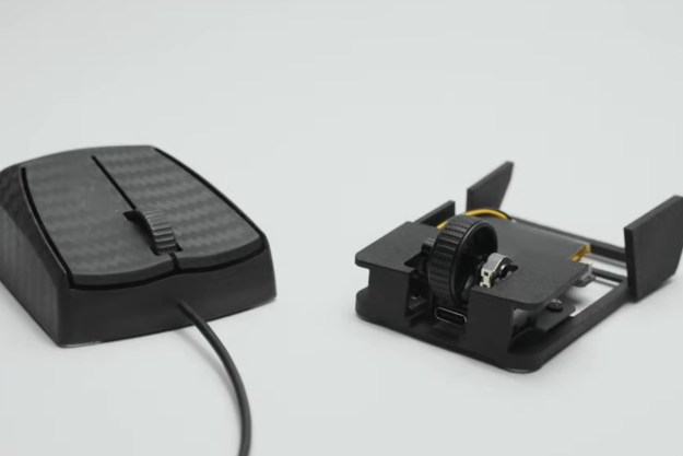 OptimumTech's Zeromouse alongside a regular mouse.