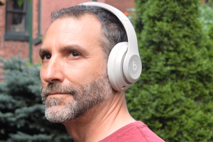 Man wearing Beats Studio Pro (front view).