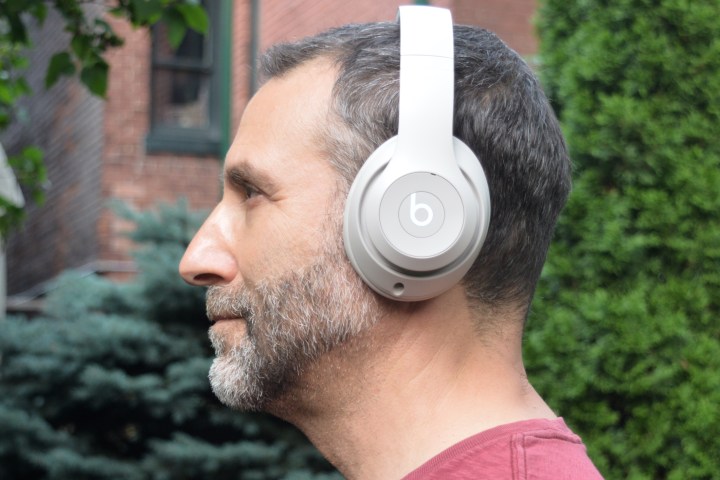 Man wearing Beats Studio Pro (side view).