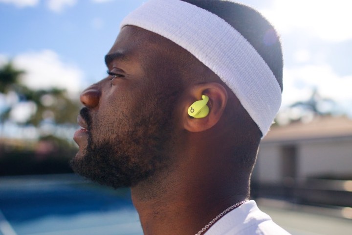 Pro tennis player Frances Tiafoe seen wearing the Beats Fit Pro in Volt Yellow.