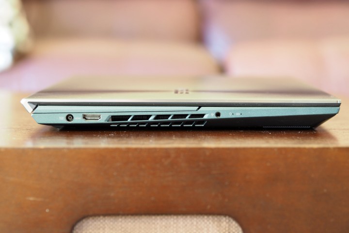 Right side view of closed Asus ZenBook Pro Duo 15 showing plug in ports.