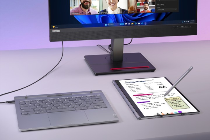 The ThinkBook Plus Hybrid plugged into a monitor with the tablet detached.
