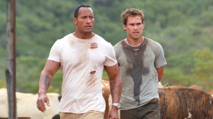 Dwayne Johnson and Seann William Scott take a sweaty walk together.