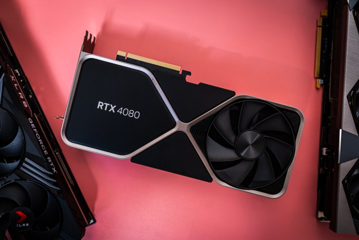 Nvidia GeForce RTX 4080 lays on a pink surface.