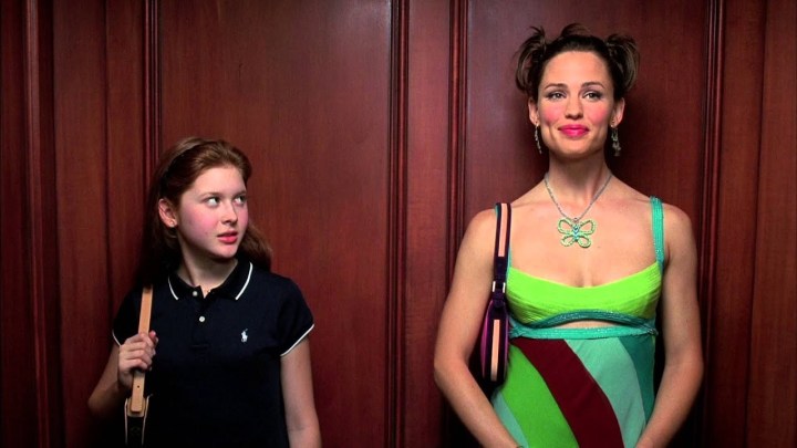 A woman and a girl ride the elevator in 13 Going on 30.