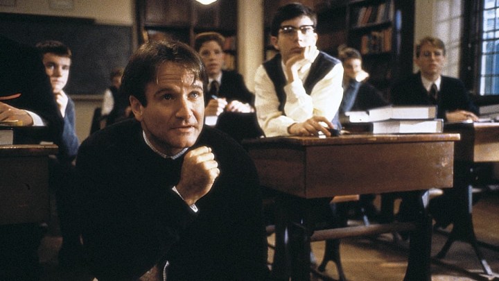 Robin Williams on his knees in the classroom on Dead Poets Society.