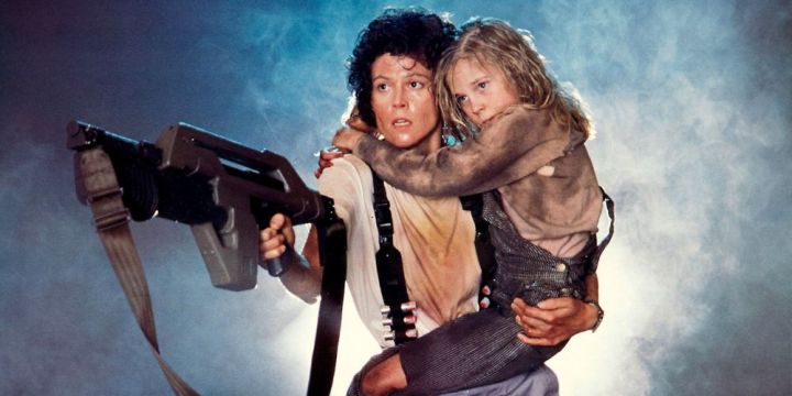 Ellen Ripley holds a gun in Aliens