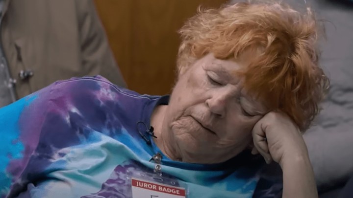 Barbara from Jury Duty slumped over, dozing off during the trial.