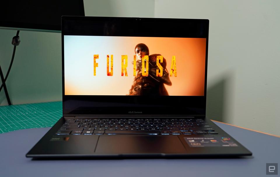 ASUS ZenBook 14 OLED playing the trailer for Furiosa.