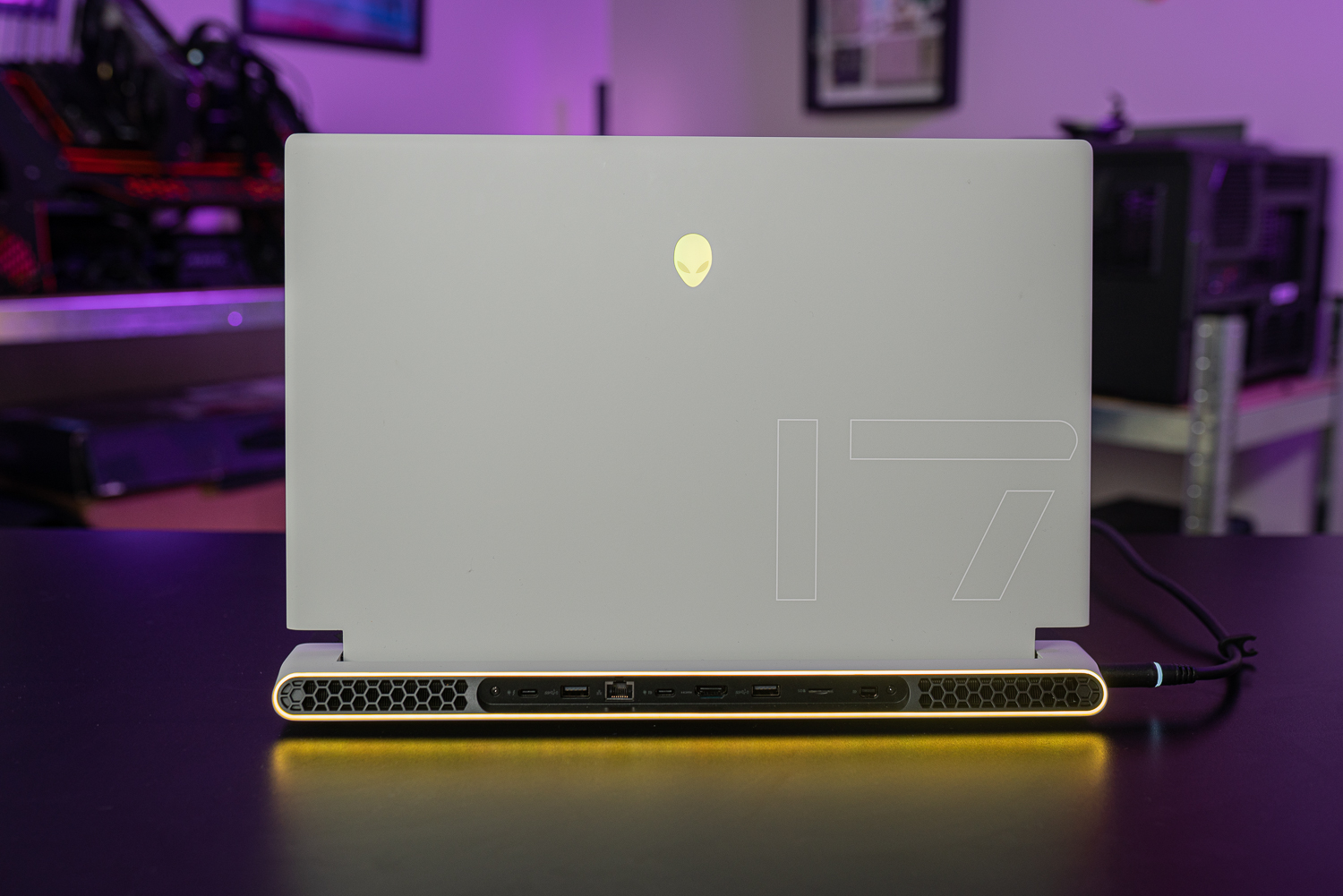 The back of the Alienware x17 R2 as it's sitting on a desk.