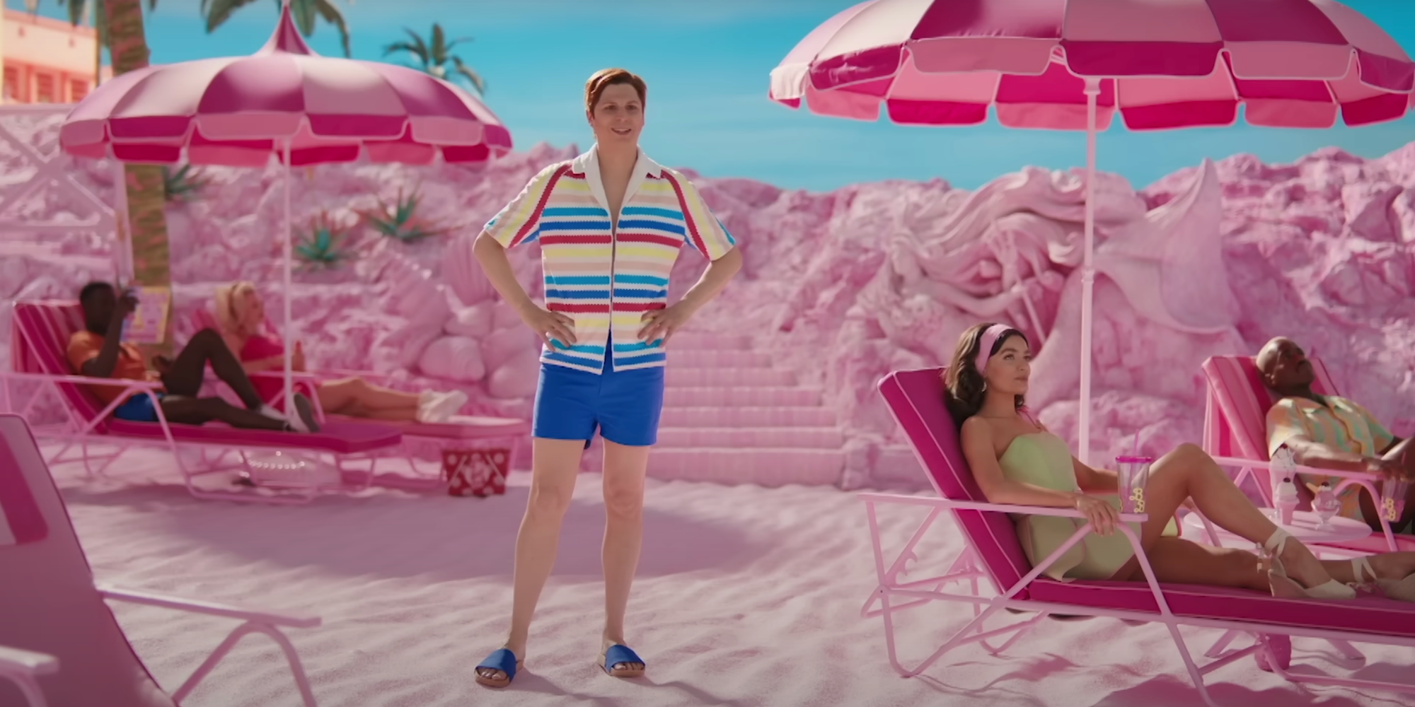 Michael Cera as Allan standing on the beach in Barbie