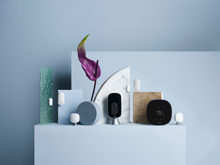 EcoBee SmartCamera on shelf with other smart home gadgets.