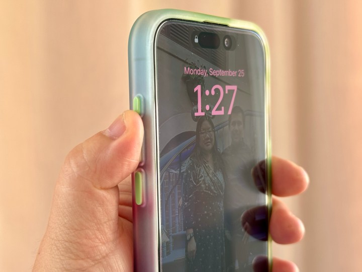 OtterBox Figura Series case on an iPhone 15 Pro showing the Action button cover.