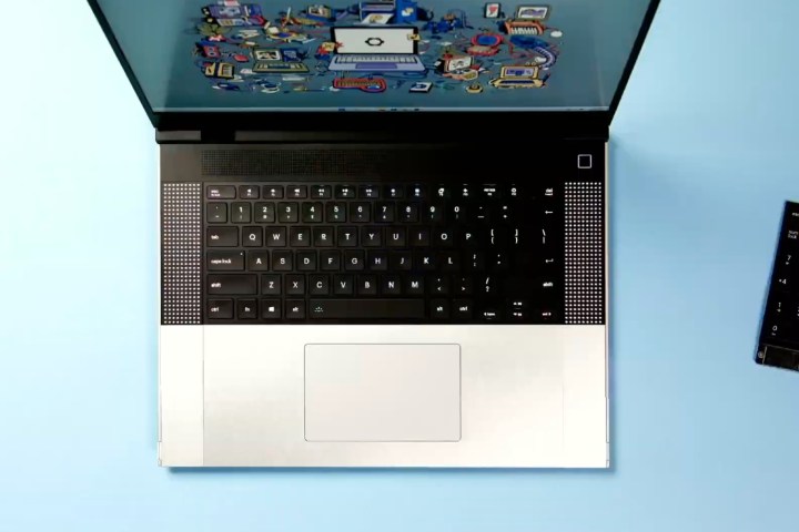 A top down view of the Framework Laptop 16 against a blue backdrop.